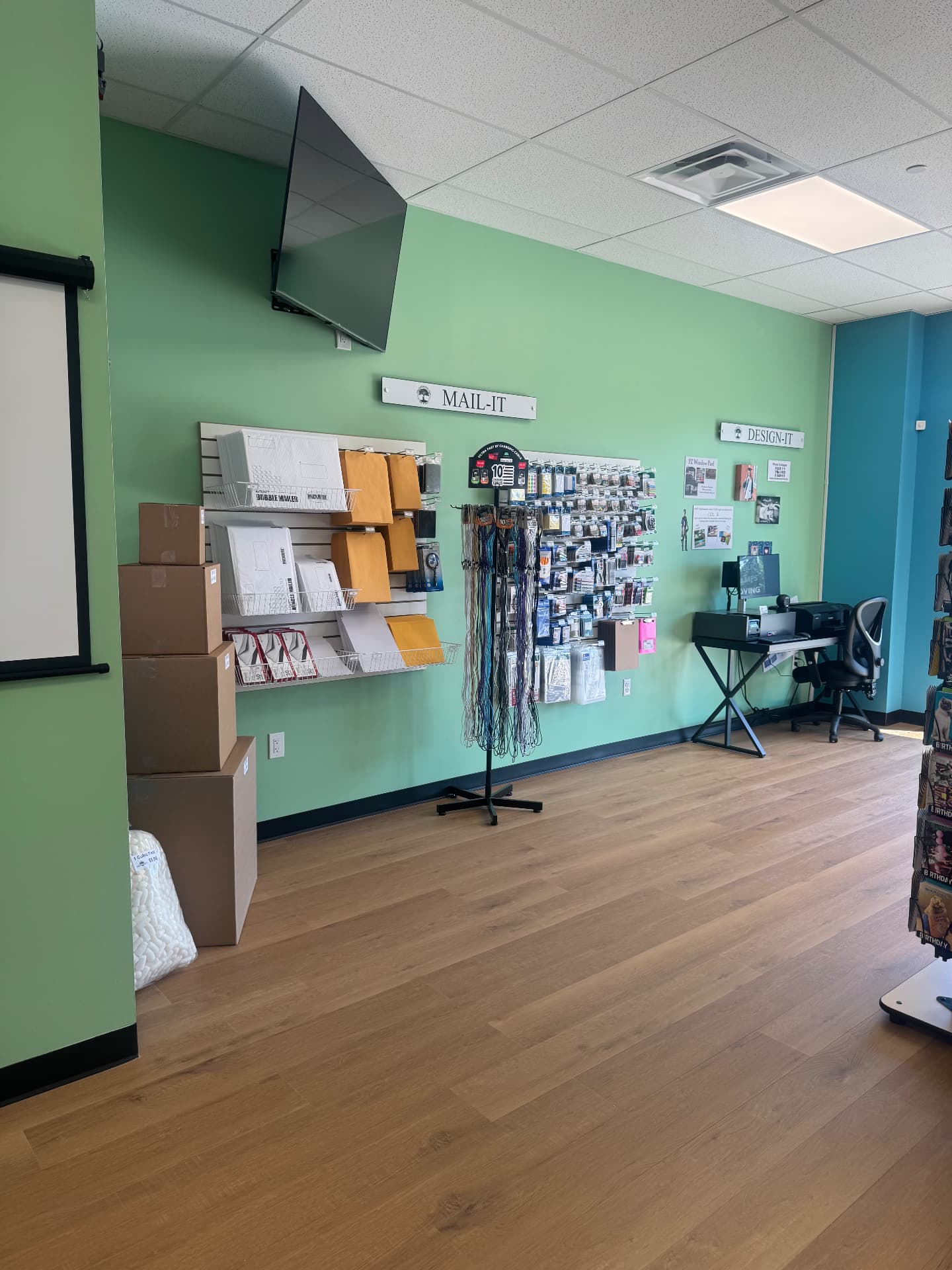 Mail-It wall with envelopes, bubble mailers and shipping supplies at The Connection Tree Ship and Print in Freehold, New Jersey